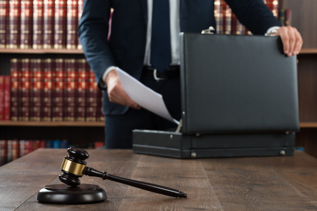 A lawyer handling an automotive litigation case in Michigan.